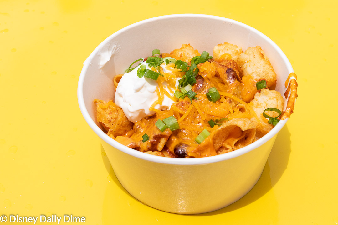 https://disneydailydime.com/wp-content/uploads/2018/12/woodys-lunch-box-totchos.jpg