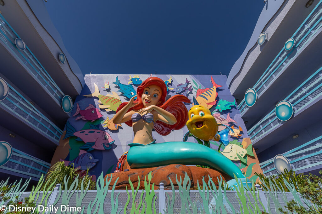 https://disneydailydime.com/wp-content/uploads/2020/04/Disney%E2%80%99s-Art-of-Animation-Little-Mermaid-Room-Review-Ariel-Statue-1024x683.jpg